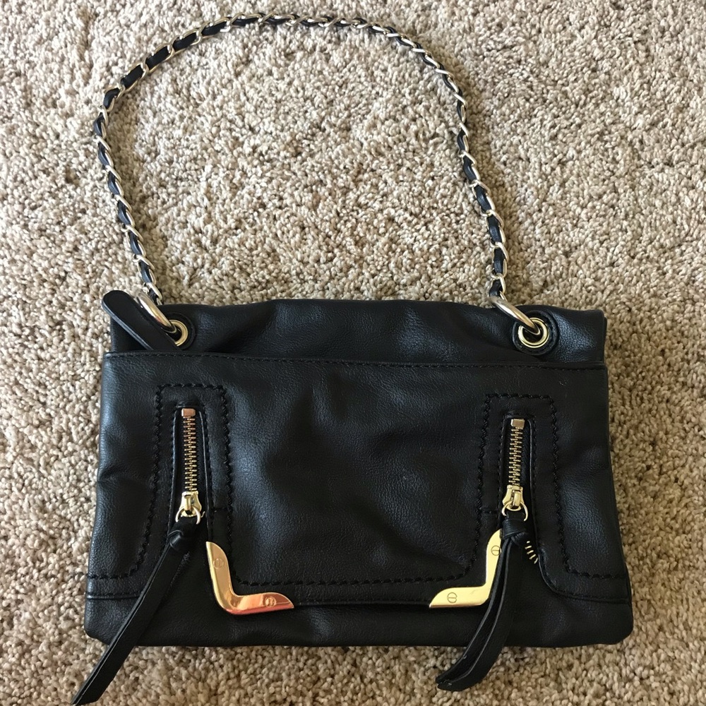Black small purse with gold metal detail